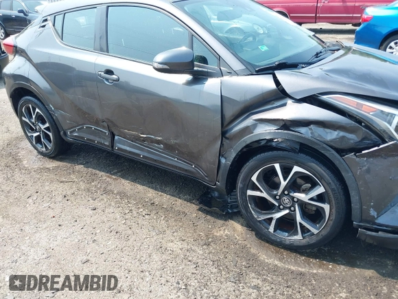 2018 Toyota C-HR XLE with VIN NMTKHMBX0JR008776, listed as a IAAI auction lot 42472338 with 48,910 mi miles and . Bid and sale history available at DreamBid. Image 17.