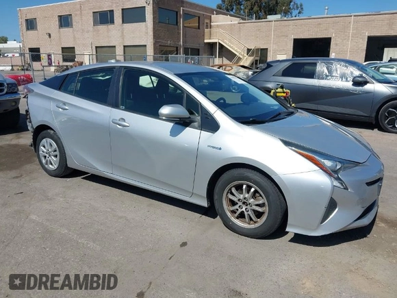 2016 Toyota Prius Two z VIN JTDKBRFU8G3007885, wystawiony jako IAAI lot #41980383 z przebiegiem 162 740 mil mil oraz . Historia ofert i sprzedaży dostępna na DreamBid. Obrazek 1.