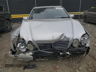 2001 Mercedes-Benz E-Class with VIN WDBJF65J71B201020, listed as a Copart auction lot 76067154 with 328,629 mi miles and Salvage Title. Bid and sale history available at carsss.com. Image 5.