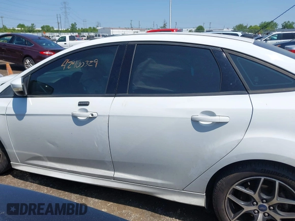 2016 Ford Focus SE with VIN 1FADP3F27GL385739, listed as a IAAI auction lot 42400329 with 114,331 mi miles and . Bid and sale history available at DreamBid. Image 15.