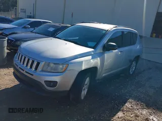 2011 Jeep Compass with VIN 1J4NT1FB8BD248904, listed as a IAAI auction lot 41667133 with 212,887 mi miles. Bid and sale history available at carsss.com. Image 2.
