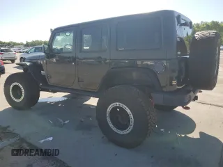 2016 Jeep Wrangler Unlimited Rubicon with VIN 1C4HJWFG3GL155092, listed as a Copart auction lot 62410365 with 82,231 mi miles and Salvage title. Bid and sale history available at DreamBid. Image 2.