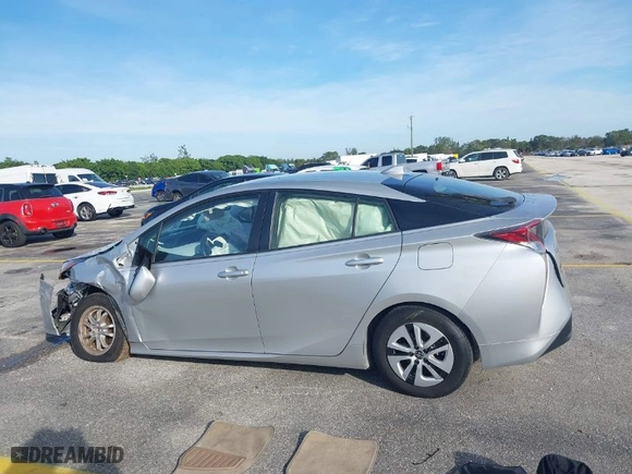 2016 Toyota Prius Four with VIN JTDKARFU1G3009156, listed as a IAAI auction lot 40906451 with 67,449 mi miles. Bid and sale history available at carsss.com. Image 14.
