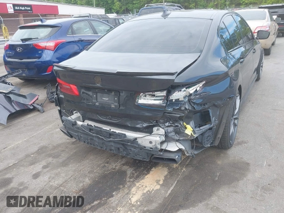 2018 BMW 5 Series M550i xDrive with VIN WBAJB9C56JB035364, listed as a IAAI auction lot 42179145 with 112,123 mi miles and . Bid and sale history available at DreamBid. Image 19.