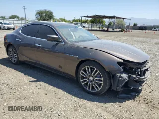 2015 Maserati Ghibli S Q4 z VIN ZAM57RTA7F1130656, wystawiony jako Copart lot #56363915 z przebiegiem 45 397 mil mil oraz Szkody całkowita. Historia ofert i sprzedaży dostępna na DreamBid. Obrazek 4.