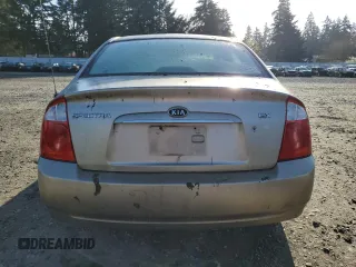 2006 Kia Spectra EX with VIN KNAFE122X65278395, listed as a Copart auction lot 51773205 with 243,978 mi miles and Salvage Title. Bid and sale history available at carsss.com. Image 6.