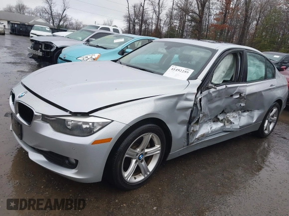 2014 BMW 3 Series 328d with VIN WBA3D3C58EK154345, listed as a IAAI auction lot 41492259 with 127,232 mi miles and . Bid and sale history available at carsss.com. Image 6.