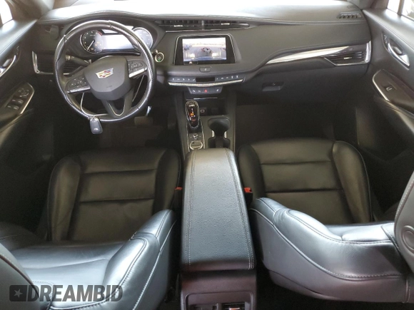 2022 Cadillac XT4 FWD Luxury с VIN 1GYAZAR40NF120224, выставлен на аукционе Copart как лот 61100285 с пробегом 35 260 миль миль и Списание • Salvage title. История ставок и продаж доступна на DreamBid. Изображение 8.