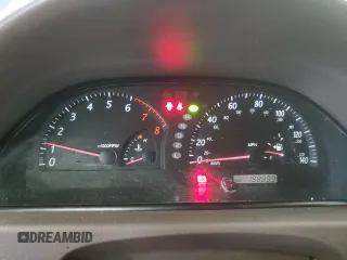 2004 Toyota Camry LE z VIN 4T1BE32K94U820825, wystawiony jako Copart lot #60972565 z przebiegiem 198 899 mil mil oraz Czysty tytuł • Clean title. Historia ofert i sprzedaży dostępna na DreamBid. Obrazek 9.