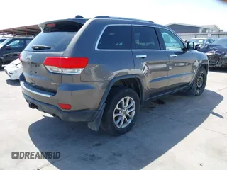 2014 Jeep Grand Cherokee Limited z VIN 1C4RJFBT0EC241030, wystawiony jako IAAI lot #41851316 z przebiegiem 104 344 mil mil oraz . Historia ofert i sprzedaży dostępna na DreamBid. Obrazek 4.