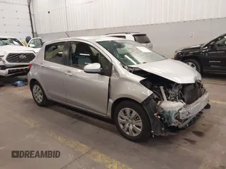 2013 Toyota Yaris L with VIN JTDKTUD36DD557084, listed as a IAAI auction lot 41502228 with 174,185 mi miles. Bid and sale history available at carsss.com. Image 1.