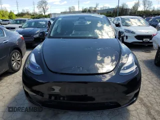 2023 Tesla Model Y Performance z VIN 7SAYGDEFXPF948763, wystawiony jako Copart lot #50562134 z przebiegiem 948 mil mil oraz Szkoda całkowita • Salvage title. Historia ofert i sprzedaży dostępna na DreamBid. Obrazek 5.