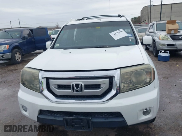 2011 Honda Pilot EX-L with VIN 5FNYF3H67BB014641, listed as a IAAI auction lot 41276698 with 193,656 mi miles and . Bid and sale history available at DreamBid. Image 12.