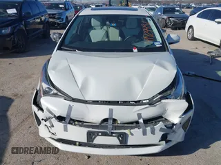 2017 Toyota Prius Two z VIN JTDKARFU9H3043444, wystawiony jako IAAI lot #41729481 z przebiegiem 148 706 mil mil oraz . Historia ofert i sprzedaży dostępna na DreamBid. Obrazek 12.