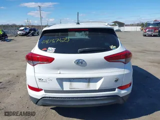 2016 Hyundai Tucson SE with VIN KM8J23A48GU127546, listed as a IAAI auction lot 41813750 with 108,107 mi miles. Bid and sale history available at carsss.com. Image 16.