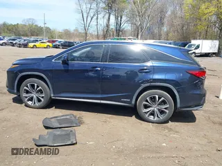 2019 Lexus RX 450hL Premium with VIN JTJDGKCA4K2006465, listed as a IAAI auction lot 42079022 with 77,241 mi miles and . Bid and sale history available at DreamBid. Image 14.