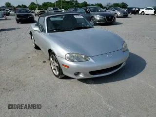 2001 Mazda MX-5 Miata z VIN JM1NB353510208400, wystawiony jako Copart lot #54516515 z przebiegiem 148 198 mil mil oraz Czysty tytuł • Clean title. Historia ofert i sprzedaży dostępna na DreamBid. Obrazek 13.