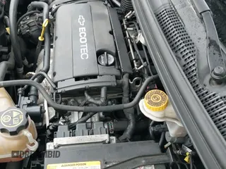 2018 Chevrolet Sonic LS z VIN 1G1JB5SG8J4114322, wystawiony jako IAAI lot #41810179 z przebiegiem 74 797 mil mil oraz . Historia ofert i sprzedaży dostępna na DreamBid. Obrazek 19.