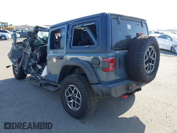 2024 Jeep Wrangler Rubicon with VIN 1C4PJXFG1RW335531, listed as a IAAI auction lot 40800569 with Not Provided miles. Bid and sale history available at carsss.com. Image 3.