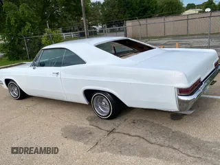 1966 Chevrolet Impala z VIN 164376R130769, wystawiony jako Copart lot #56249945 z przebiegiem 26 996 mil mil oraz Czysty tytuł • Clean title. Historia ofert i sprzedaży dostępna na DreamBid. Obrazek 3.