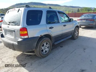 2006 Ford Escape XLT with VIN 1FMYU93126KC36402, listed as a IAAI auction lot 42122882 with 192,899 mi miles and . Bid and sale history available at DreamBid. Image 4.