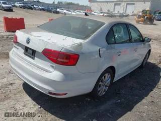 2015 Volkswagen Jetta Sedan 1.8T Sport with VIN 3VWD17AJ9FM321682, listed as a IAAI auction lot 41889188 with 135,238 mi miles. Bid and sale history available at carsss.com. Image 4.