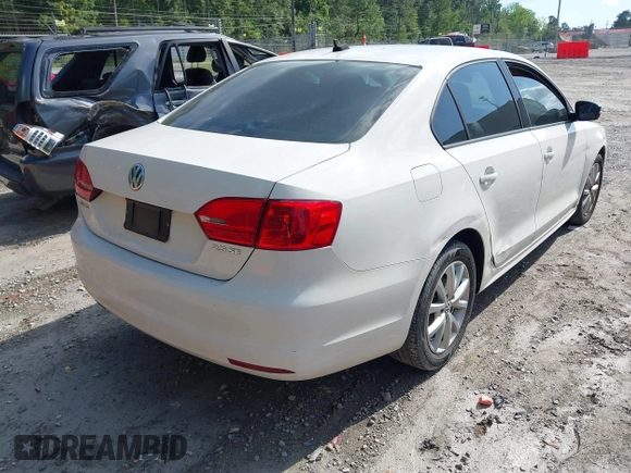2012 Volkswagen Jetta Sedan SE w/Convenience & Sunroof with VIN 3VWDX7AJ9CM341490, listed as a IAAI auction lot 42147872 with 207,723 mi miles. Bid and sale history available at carsss.com. Image 4.