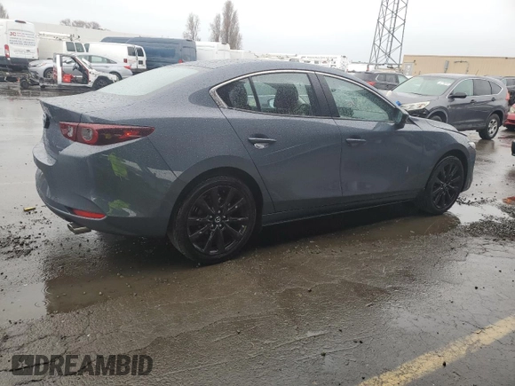2025 Mazda 3 S Carbon Edition with VIN JM1BPBCM3S1767854, listed as a Copart auction lot 43643335 with 1,065 mi miles and Salvage Title. Bid and sale history available at DreamBid. Image 3.