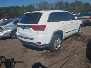 2012 Jeep Grand Cherokee Laredo with VIN 1C4RJEAG5CC106203, listed as a IAAI auction lot 41821138 with 157,474 mi miles. Bid and sale history available at carsss.com. Image 4.