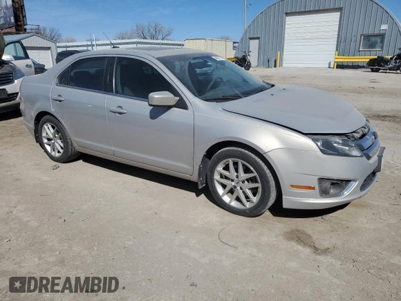 2010 Ford Fusion SEL with VIN 3FAHP0JG7AR356186, listed as a Copart auction lot 48987375 with 130,126 mi miles and Salvage Title. Bid and sale history available at DreamBid. Image 4.