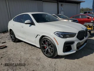 2022 BMW X6 xDrive40i with VIN 5UXCY6C09N9J04735, listed as a Copart auction lot 45084665 with 46,543 mi miles and Salvage Title. Bid and sale history available at carsss.com. Image 4.