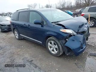 2011 Toyota Sienna LE AAS with VIN 5TDKK3DC4BS094456, listed as a IAAI auction lot 41956894 with 176,882 mi miles. Bid and sale history available at carsss.com. Image 1.