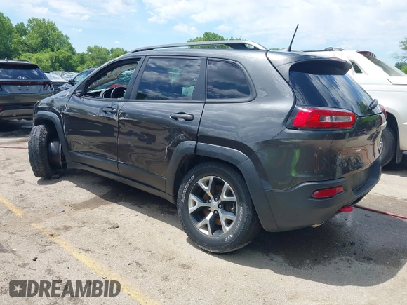 2017 Jeep Cherokee Trailhawk z VIN 1C4PJMBB8HW654321, wystawiony jako IAAI lot #42318465 z przebiegiem 137 923 mil mil oraz . Historia ofert i sprzedaży dostępna na DreamBid. Obrazek 3.