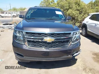 2017 Chevrolet Tahoe LS with VIN 1GNSCAKC3HR328833, listed as a IAAI auction lot 41993364 with 124,817 mi miles and . Bid and sale history available at DreamBid. Image 12.
