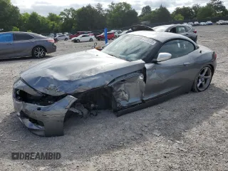 2011 BMW Z4 sDrive35is with VIN WBALM1C50BE633213, listed as a Copart auction lot 61220135 with 62,458 mi miles and Salvage title. Bid and sale history available at DreamBid. Image 1.