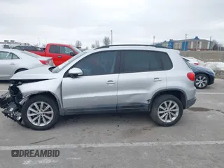 2015 Volkswagen Tiguan SE with VIN WVGAV7AX5FW592216, listed as a IAAI auction lot 41401020 with 110,726 mi miles and . Bid and sale history available at DreamBid. Image 15.