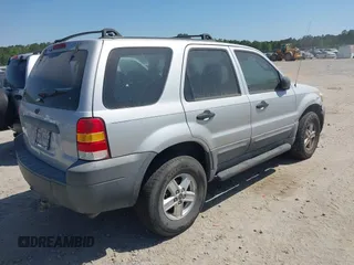 2005 Ford Escape XLS Value with VIN 1FMYU02Z35KD14123, listed as a IAAI auction lot 41989367 with 255,422 mi miles. Bid and sale history available at carsss.com. Image 4.