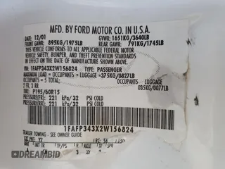 2002 Ford Focus SE with VIN 1FAFP343X2W156824, listed as a Copart auction lot 54834615 with 248,849 mi miles and Salvage Title. Bid and sale history available at carsss.com. Image 12.