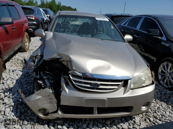 2006 Kia Spectra EX z VIN KNAFE121265353582, wystawiony jako Copart lot #52747635 z przebiegiem 99 087 mil mil oraz Szkoda całkowita • Salvage title. Historia ofert i sprzedaży dostępna na DreamBid. Obrazek 5.