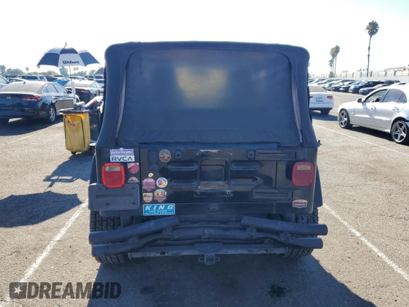 2005 Jeep Wrangler Rubicon with VIN 1J4FA69SX5P343826, listed as a Copart auction lot 69074374 with 179,610 mi miles and Salvage Title. Bid and sale history available at carsss.com. Image 6.