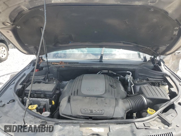 2015 Dodge Durango R/T with VIN 1C4SDHCT1FC891781, listed as a Copart auction lot 62664555 with 107,573 mi miles and Salvage title. Bid and sale history available at DreamBid. Image 12.