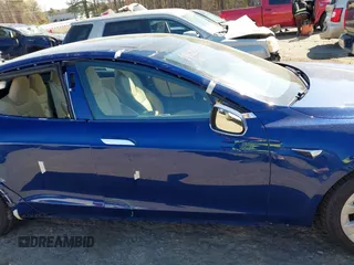 2017 Tesla Model S 60 with VIN 5YJSA1E19HF186227, listed as a IAAI auction lot 41888015 with 105,510 mi miles and . Bid and sale history available at DreamBid. Image 14.