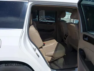 2016 Mercedes-Benz GL with VIN 4JGDF6EE4GA712535, listed as a IAAI auction lot 41822698 with 143,208 mi miles. Bid and sale history available at carsss.com. Image 8.