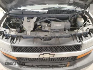 2009 Chevrolet Express Passenger z VIN 1GAGG25K691140635, wystawiony jako Copart lot #88503195 z przebiegiem 144 026 mil mil oraz Szkoda całkowita • Salvage title. Historia ofert i sprzedaży dostępna na DreamBid. Obrazek 12.