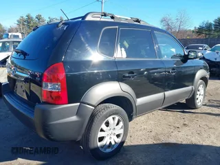 2007 Hyundai Tucson SE with VIN KM8JN72D17U590769, listed as a IAAI auction lot 41003503 with 143,462 mi miles and . Bid and sale history available at DreamBid. Image 4.