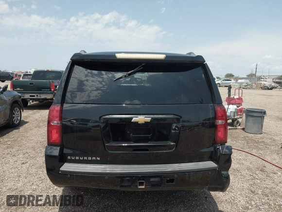2016 Chevrolet Suburban LS with VIN 1GNSCGKCXGR261780, listed as a IAAI auction lot 42348999 with 266,151 mi miles and . Bid and sale history available at DreamBid. Image 16.