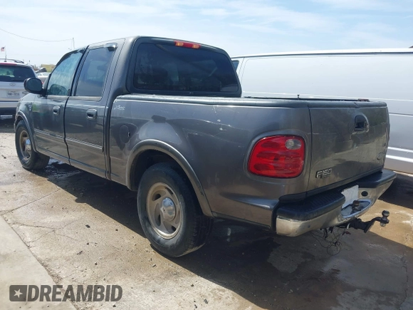 2003 Ford F-150 XLT with VIN 1FTRW076X3KA76379, listed as a IAAI auction lot 41821131 with 221,081 mi miles. Bid and sale history available at carsss.com. Image 3.