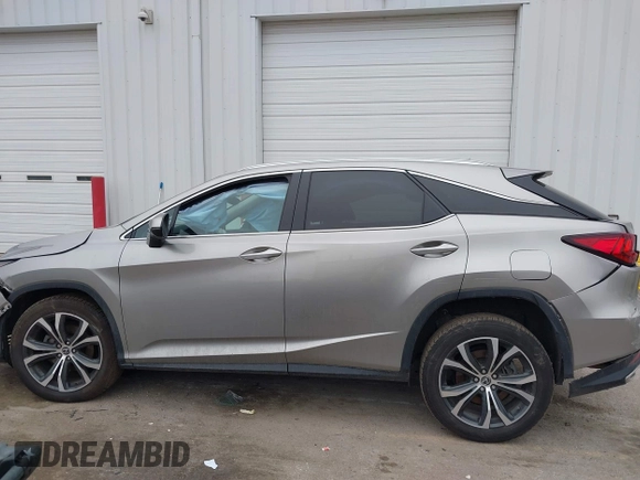 2021 Lexus RX with VIN 2T2HZMDA4MC305057, listed as a IAAI auction lot 41706486 with 37,518 mi miles. Bid and sale history available at carsss.com. Image 15.