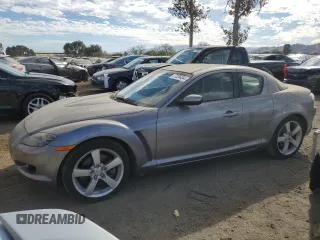 2004 Mazda RX-8 with VIN JM1FE17N240117619, listed as a Copart auction lot 77235454 with 121,887 mi miles and Clean Title. Bid and sale history available at carsss.com. Image 1.