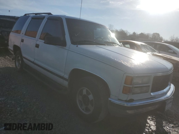 1999 GMC Yukon with VIN 1GKEC13R6XJ808715, listed as a Copart auction lot 83407094 with 340,933 mi miles and Salvage Title. Bid and sale history available at carsss.com. Image 4.